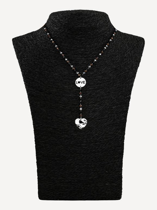 Collana con perle e ciondoli