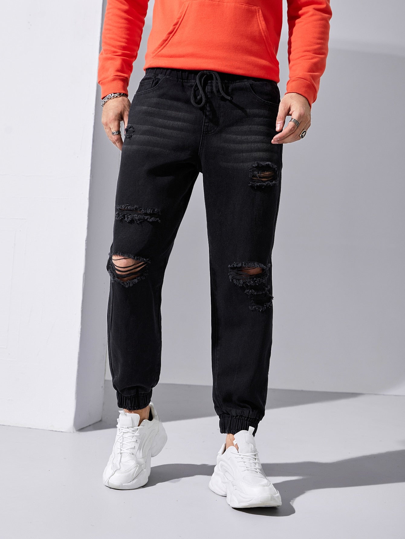 Jeans a carota hot sale strappati uomo